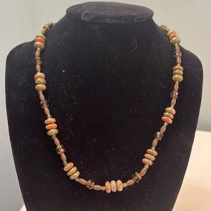 N56. Green stone necklace.